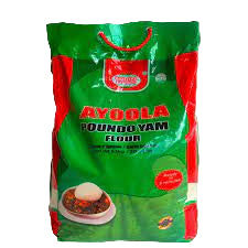 A pack of Ayoola pundo  Yam Flour with a green and red design on a wooden surface.