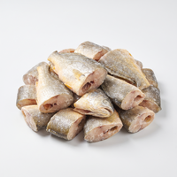 Bulk 5kg quantity of frozen yellow croaker fish steaks on a white background